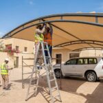 كيف تختار أفضل أنواع القماش لمظلات السيارات بالرياض